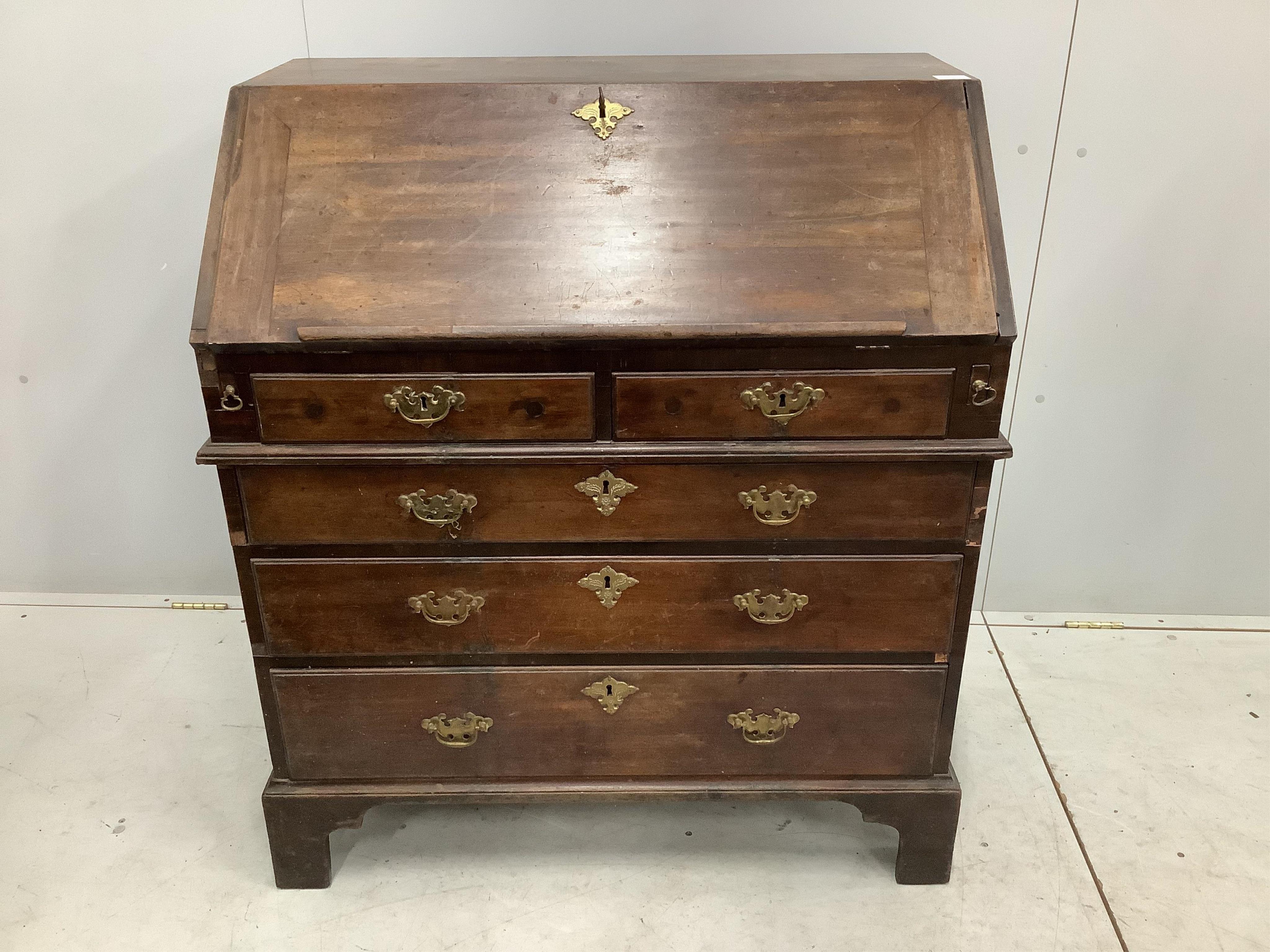 A George III mahogany bureau, width 96cm, depth 56cm, height 106cm. Condition - poor to fair, top with two areas of lost moulding